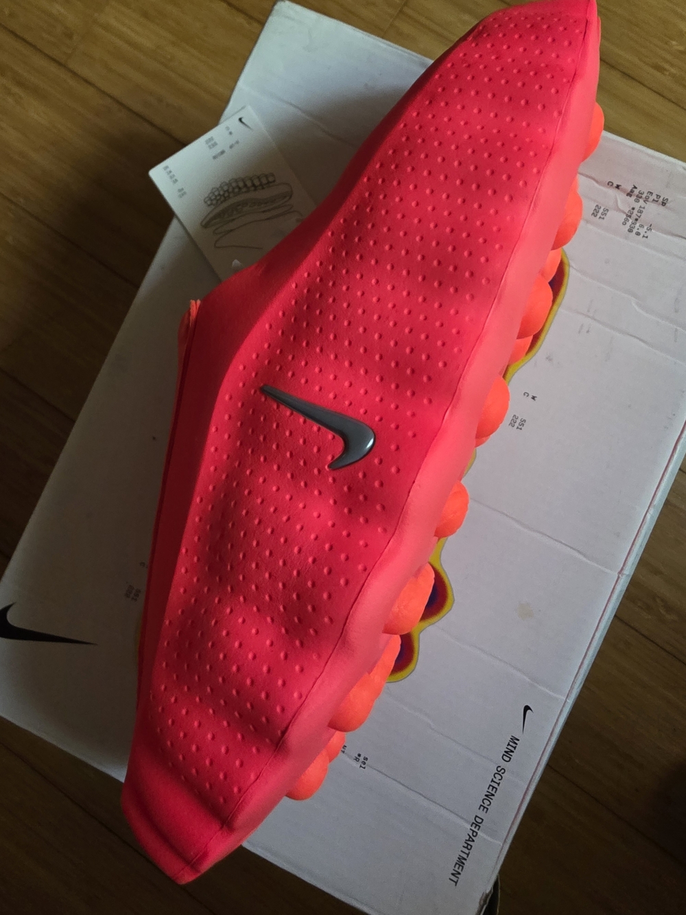 Nike Neon Pink Slip-On Athletic Shoes with Silver Swoosh